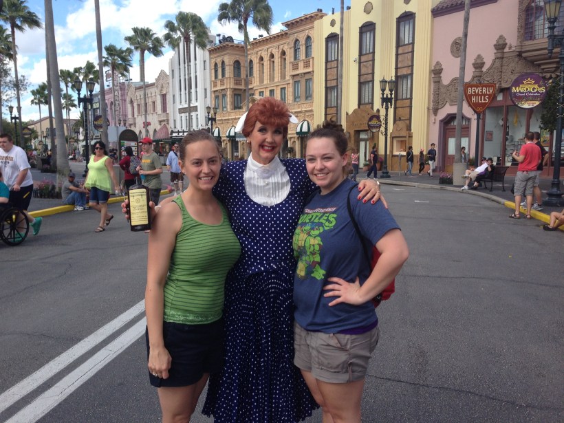A Lucille Ball look-alike poses at Universal Studios, FL, with my sister and me